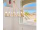 Ornate chandelier in the entryway with a large window view at 6832 Forkmead Ln, Port Orange, FL 32128