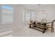 Formal dining room with a rustic wooden table and bench at 6832 Forkmead Ln, Port Orange, FL 32128