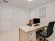 Bright home office with a desk, chair, and ample space to work at 6832 Forkmead Ln, Port Orange, FL 32128
