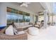 Spacious patio with wicker furniture and a view of the pool at 6832 Forkmead Ln, Port Orange, FL 32128