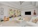 Large playroom with built-in shelving, a comfy couch, and a TV at 6832 Forkmead Ln, Port Orange, FL 32128