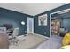 Comfortable bedroom with desk, carpeting and closet at 728 Vicksburg St, Deltona, FL 32725