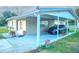 Covered carport with parking for one car at 734 Hager Street, Deltona, FL 32725