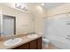 Bathroom with double vanity and tub at 805 Gordonia Ct, Deland, FL 32724