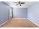 Spacious bedroom with neutral walls and carpeted floors at 805 Gordonia Ct, Deland, FL 32724