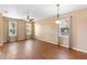 Bright dining room featuring wood floors and natural light at 805 Gordonia Ct, Deland, FL 32724