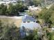 Aerial view of a house with detached garage and large yard at 811 W Minnesota Ave, Deland, FL 32720