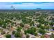 Drone shot of neighborhood, near Aunt Catfish's and Winn-Dixie, showcasing the many trees in the area at 949 Tall Pine Dr, Port Orange, FL 32127