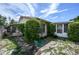 Landscaped backyard with patio and lush greenery at 1016 Martex Dr, Apopka, FL 32703