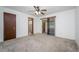 Bright bedroom with carpet flooring, double door closet and sliding glass doors at 1016 Martex Dr, Apopka, FL 32703