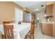 Cozy dining area with wood table and chairs near the kitchen at 1016 Martex Dr, Apopka, FL 32703
