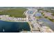 Wide aerial shot of a lake community showcasing a beautiful home and neighborhood amenities at 105 Cerise Ct, Daytona Beach, FL 32124