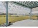 Backyard with covered patio overlooking a lake at 105 Cerise Ct, Daytona Beach, FL 32124