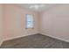 Bedroom features pale pink walls, wood-look flooring, and a window at 105 Cerise Ct, Daytona Beach, FL 32124