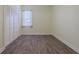 Bright bedroom features light green walls, a window, and a closet with paneled doors at 105 Cerise Ct, Daytona Beach, FL 32124
