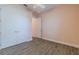 Bedroom with pink walls, a ceiling fan, and a closet with double doors at 105 Cerise Ct, Daytona Beach, FL 32124