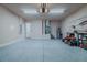 Spacious garage with epoxy floor and access door to the house at 105 Cerise Ct, Daytona Beach, FL 32124