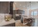 Modern kitchen featuring stainless steel appliances, granite countertops, and a center island with seating at 105 Cerise Ct, Daytona Beach, FL 32124