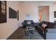 Comfortable living room with a large TV and modern decor, perfect for relaxing and entertaining at 105 Cerise Ct, Daytona Beach, FL 32124