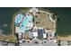 Aerial view of a community pool area, including a pool, playground, and recreation facilities at 105 Cerise Ct, Daytona Beach, FL 32124