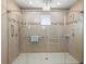 Walk-in shower with dual shower heads and grab bars at 108 Blanco Dr, Deland, FL 32724