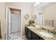 Bathroom with granite double vanity, and shower stall at 108 Blanco Dr, Deland, FL 32724