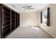Bedroom featuring built-in shelves, crown molding, and a bright window at 108 Blanco Dr, Deland, FL 32724