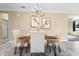 Elegant dining room featuring a chandelier and a wooden table with seating at 108 Blanco Dr, Deland, FL 32724