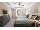 Tranquil main bedroom featuring a tray ceiling, soft lighting, and neutral tones at 108 Blanco Dr, Deland, FL 32724