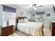 Bright bedroom with double bed and ample closet space at 1081 Treadway Dr, Deltona, FL 32738