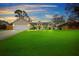 Well-maintained house with a spacious lawn and attached garage at 1081 Treadway Dr, Deltona, FL 32738