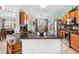 Kitchen with granite countertops, wooden cabinets, and stainless steel appliances at 1081 Treadway Dr, Deltona, FL 32738