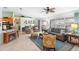 Cozy living room with gray sofa and patterned armchairs at 1081 Treadway Dr, Deltona, FL 32738