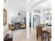 Open living and dining area with tiled floors and neutral decor at 1081 Treadway Dr, Deltona, FL 32738