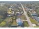 A cozy home with a fenced backyard and a well-maintained lawn in a quiet neighborhood with mature trees at 1195 10Th St, Daytona Beach, FL 32117