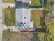 A cozy home with a well-maintained yard, a nice backyard, and a convenient driveway at 1195 10Th St, Daytona Beach, FL 32117