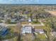 Cozy home with fenced backyard and a lovely lawn on a quiet residential street with mature trees at 1195 10Th St, Daytona Beach, FL 32117