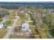 Cozy home with fenced backyard and a lovely lawn on a street with mature trees at 1195 10Th St, Daytona Beach, FL 32117
