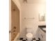 Full bathroom with retro sink, tile floors, and shower at 1195 10Th St, Daytona Beach, FL 32117
