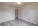 Neutral bedroom featuring gray floors and a closet at 1195 10Th St, Daytona Beach, FL 32117