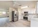 Open concept kitchen with stainless steel appliances and easy access to the living area at 1195 10Th St, Daytona Beach, FL 32117