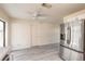 Kitchen featuring a stainless steel refrigerator, gray floors, and bright natural light at 1195 10Th St, Daytona Beach, FL 32117
