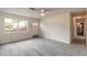 Front Living Room with light gray wood floors and natural lighting at 1195 10Th St, Daytona Beach, FL 32117