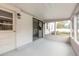 Enclosed patio with sliding glass doors leading indoors at 1195 10Th St, Daytona Beach, FL 32117