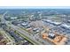 Sprawling community featuring commercial centers, residential areas, and scenic waterways at 1372 Lombardi Ct, Poinciana, FL 34759