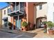 Picturesque storefront with vibrant planters, stylish signage, and charming architectural details at 1372 Lombardi Ct, Poinciana, FL 34759