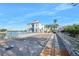 Scenic street view with charming building, a bridge over water and well-maintained sidewalks at 1372 Lombardi Ct, Poinciana, FL 34759