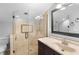 Bathroom featuring glass-enclosed shower with tile surround and a vanity with sink at 149 Sheryl Dr, Deltona, FL 32738