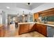 Bright kitchen with granite countertops, stainless appliances, and breakfast nook at 149 Sheryl Dr, Deltona, FL 32738