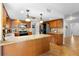 Kitchen featuring an island, stainless steel appliances, and granite countertops at 149 Sheryl Dr, Deltona, FL 32738